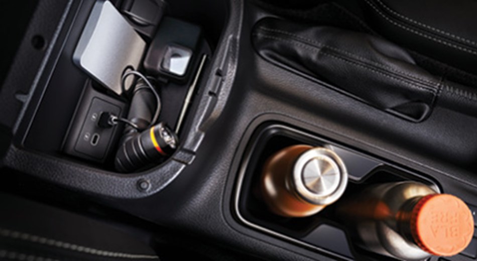 CUPHOLDER AND MOBILE PHONE STORAGE STATION-Vehicle Feature Image